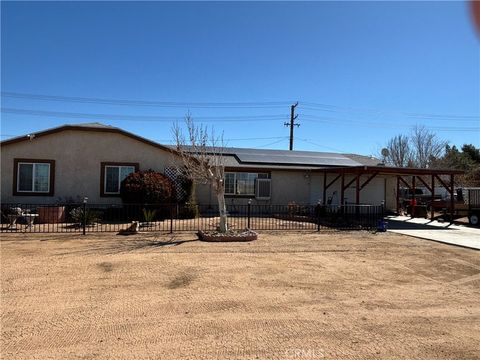Photo of 11545 Kiowa Rd, Apple Valley, CA 92308 (MLS # CV26055166)