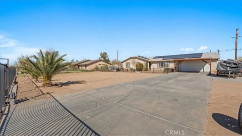 Photo of 11545 Kiowa Rd, Apple Valley, CA 92308 (MLS # CV26055166)