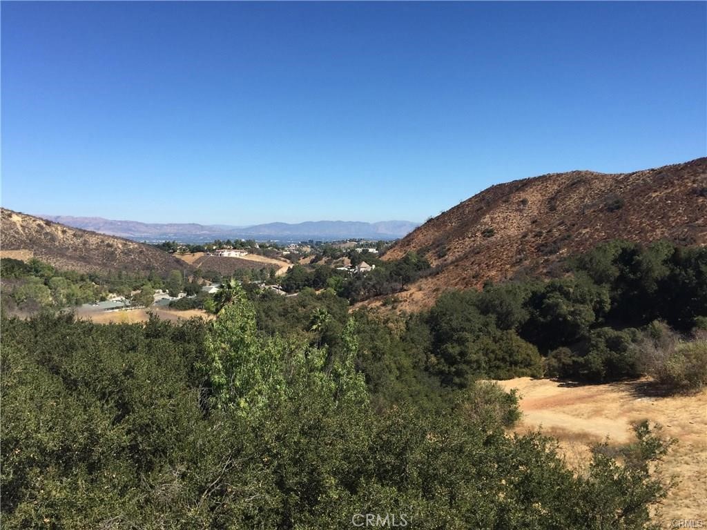Warm and welcoming 2 bed / 1 bath apartment with lovely mountain views. This charming unit is set in the Calabasas Highlands and is the perfect place to relax and recharge. A sweet country lane invites you to a gate where a courtyard awaits with access to a private step down staircase leading to a spacious un-furnished apartment. Ideal for a professional searching for a quiet work from home location this special apartment is suited for a maximum occupancy of 2. The floorplan is thoughtfully designed with the bedrooms separated by the living / dining room. The fully functional kitchen offers additional storage space and access to a separate laundry room. Rent includes utilities. Minimum lease is 12 months with renters insurance required. There is no smoking allowed on the premises and no pets. This light and bright unit is ready for move in today!