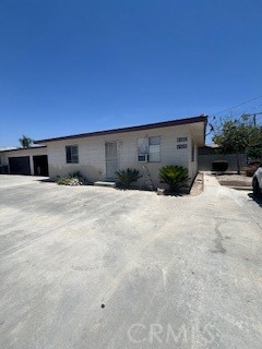This is a cute home for small family or senior close to schools and shopping. Nice area clean and roomy large bedrooms and living room. There is no front or rear yard. There is a small area behind the home. Call and see for yourself. Vacant and ready to go.