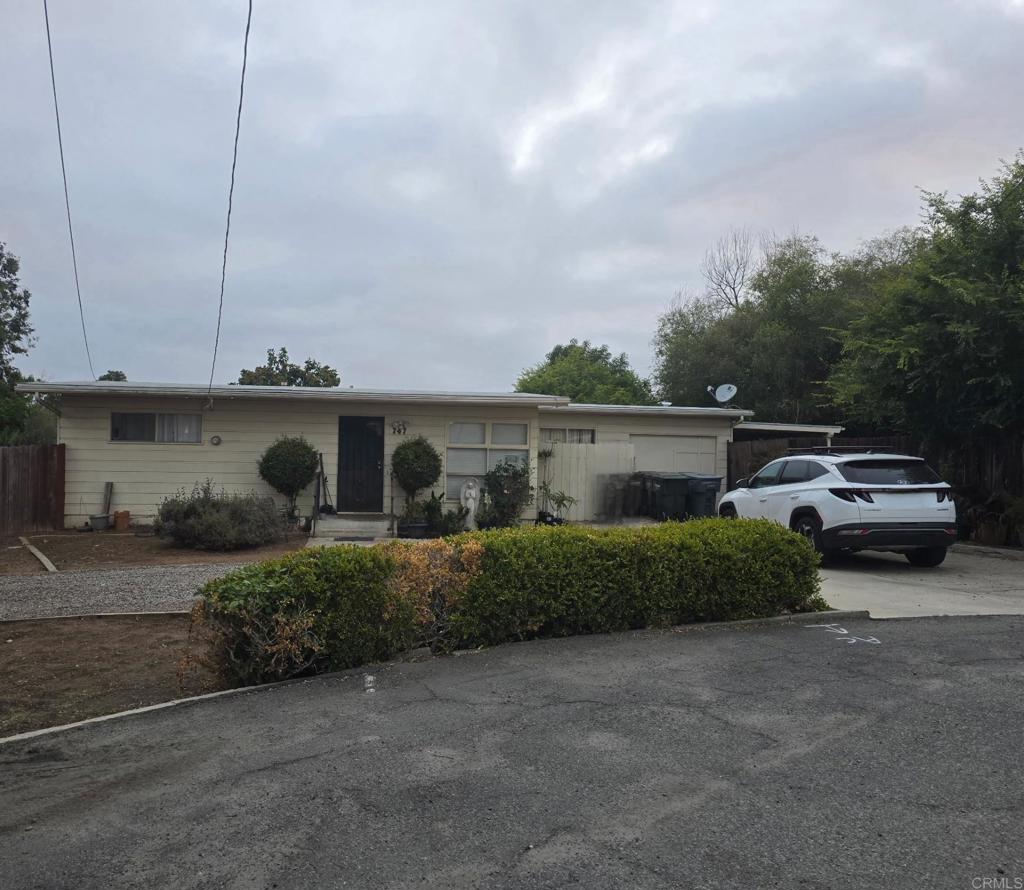 small house on a half acre flat lot. Approx 3 miles to the County Seat, 78 fwy, restaurants, shopping and banking. Property is part of a trust and in a 1031 exchange. Escrow and title to be Chicago title. 1031 exchange accommodater is IPX. Zoned E1. No egress, double cul-de-sac streets. Do not disturb tenant. Do not enter gated fenced yard. Shown with accepted offer. Owner is a R.E broker. Broker will e-mail interior and garden pictures to agents upon request. Laundry room 12 ft X 8 ft and attached sunroom 20 ft X 10 ft not included in total sq. ft.