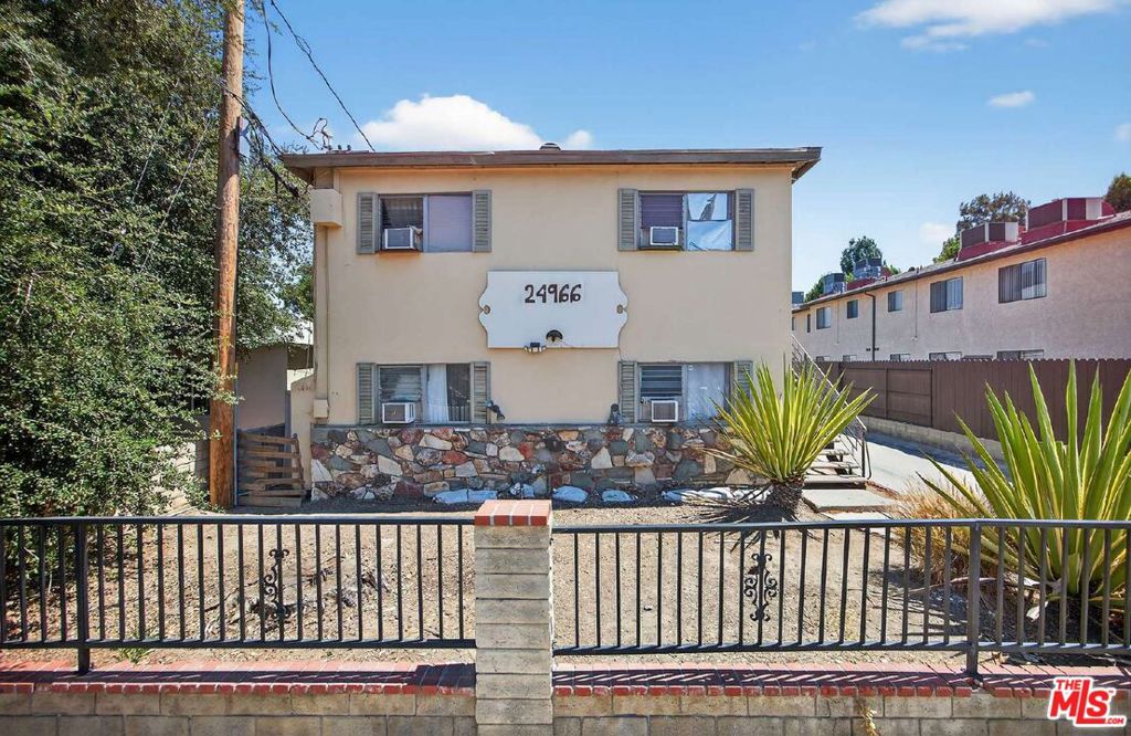 24966 Walnut Street offers investors a rare chance to acquire a nine-unit multifamily property in the heart of Santa Clarita, one of Los Angeles County's most desirable and rapidly developing suburban markets. Featuring all two-bedroom, one-bathroom floor plans, the property delivers an ideal layout for working families and long-term renters, generating $13,525 per month in gross rental income. With below-market rents across the board, the asset presents clear potential for substantial income growth through targeted renovations and repositioning. Constructed in 1962 and totaling 6,458 square feet, the building is situated on a quiet residential street and has been home to long-term tenants, many of whom are paying significantly under market rates. Located within the City of Santa Clarita which has no local rent control new ownership can take advantage of full flexibility to adjust rents to market levels as units turn over, subject only to California's AB 1482 guidelines. The combination of stable in-place income and meaningful value-add potential makes this an exceptional opportunity for both cash flow and long-term appreciation. Positioned in a high-income, high-growth suburban community, the property benefits from proximity to major job centers, new development, and convenient transportation options. Santa Clarita is home to a strong and diversified economy, anchored by industries such as entertainment, healthcare, and education. Nearby attractions include Disney's Golden Oak Ranch and extensive film studio infrastructure, further boosting housing demand from industry professionals. With a family-friendly atmosphere, excellent schools, and a growing population, this location offers a compelling backdrop for sustained rental demand and long-term investor success.