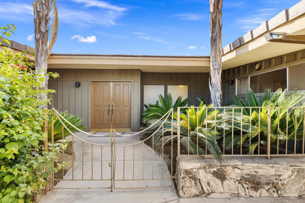 Discover the perfect blend of elegance, convenience, and iconic design in this stunning mid-century modern 3-bedroom, 2.5-bathroom home located in the heart of North La Quinta. Positioned across the street from the Big Rock Pub on the Indian Springs Golf Course, this home offers unmatched convenience and views without the restrictions of an HOA.This home radiates classic Palm Springs vibes with high ceilings, sleek lines, and thoughtfully curated furnishings. The recently remodeled kitchen features beautiful butcher block countertops, ideal for the modern chef. The sunken living room boasts a cozy stone fireplace, perfect for relaxation and gatherings. Enjoy the private jacuzzi with serene views of the greens, creating a true indoor-outdoor living experience. This home can be sold fully furnished, ready for you to enjoy from day one. Whether you're entertaining guests or enjoying a peaceful retreat, this property offers a lifestyle of elegance and tranquility. Located in North La Quinta across from Indian Springs Golf Course with no HOA and a fully furnished option available.