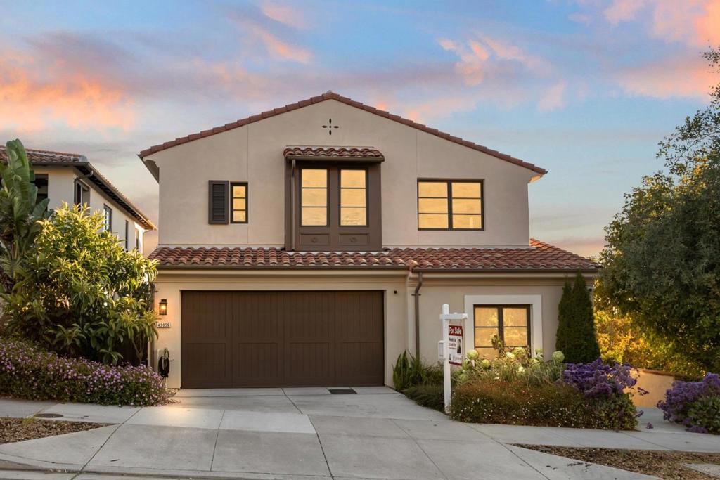 Nestled in Fremont's prestigious Mission District, this 2020-built modern Mediterranean home by Robson Homes offers 4 bedrooms and 4.5 baths,designed for luxurious family living. Ideally located within walking distance to top-rated Mission District schools, with views of Mission Peak and the Bay, this fully upgraded home features a flexible floor plan with a ground-floor bedroom suite, a home office, and a versatile bonus room perfect for remote work or multi-generational living. The open-plan living and dining areas are ideal for family gatherings and celebrations, while the gourmet kitchen includes high-end appliances, a large center island, and ample cabinetry and pantry storage. The spa-like primary suite offers a marble bath, dual vanities, an expansive walk-in shower, and a designer closet room. Equipped with a 12-panel solar PV system, 220V outlets, a security system with 5 cameras, and smart dual-zone HVAC, this energy-efficient smart home also features professionally designed landscaping throughout. Just 5 minutes walk from Mission San Jose High, with easy access to 680 and high-tech shuttle stops, this home blends luxury and convenience. Don't miss your chance to make this move-in-ready home yours!