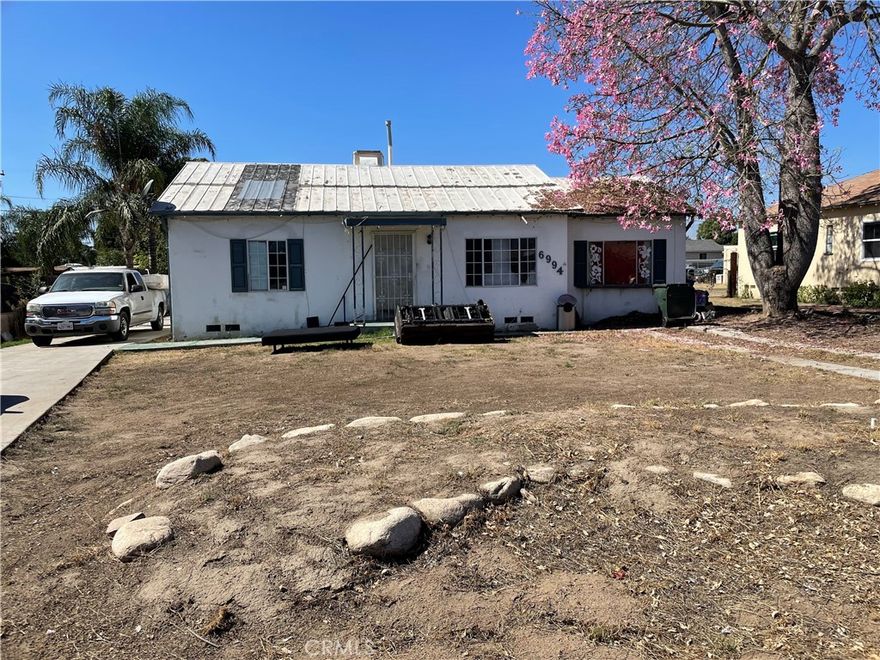 Charming Single Story house features 3 bedrooms(title shows 2 bedrooms) and 2 bathrooms ,with a Hugh back yard great for kids or entertaining, fully fenced and detached 2 car garage. . This property is located in a quiet neighborhood in the city of Highland. The san bernardino county departments are only one minute away; the fitness is approximately one mile away. The San Manuel casino is approximately five minutes away. The property also has great freeway access and is conveniently located near several grocery stores Plaza, Costco and a variety of restaurants nearby. Buyer should verify zoning, permits, size, etc. Sold AS-IS.