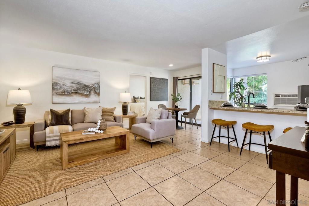 Beautiful ground floor unit located in the coveted Hyde Park Villas in San Carlos! This open concept unit features a spacious living room and an updated kitchen including granite countertops, stainless steel applinaces and white shaker cabinets. Both bedrooms have their own updated en suite and generous closet sizes. The quiet community features a pool, spa, clubhouse, onsite gym, dog park, sauna, and laundry facilities that are just steps away! Great proximity to Cowles Mountain, Mission Trails and SDSU.