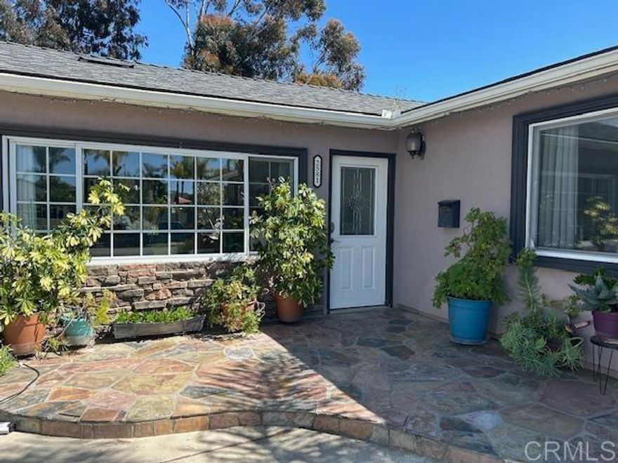 Canyon Rim Home in Coveted Birdland – Oversized Lot + ADU! This gem sits on a quiet tree-lined street on a massive 10,000 sq ft lot—more than twice the neighborhood average! Featuring 3 beds, 2 baths, and a converted detached garage ADU (used as a 4th bedroom), this home offers flexibility, views, and privacy. You'll love its open floor plan with new wood laminate flooring, dual-pane windows, a newer roof, and leased solar panels for monthly energy savings. Relax or entertain in the private large backyard with its bar and BBQ, fire pit and fireworks courtesy of nearby Snapdragon Stadium.  Located in the heart of San Diego, you're just minutes from downtown, the airport, beaches, and the brand-new Snapdragon Stadium. Enjoy quick freeway access to I-805, I-8, and Highway 163, making it easy to reach Mission Valley shopping, Balboa Park, UCSD Medical Center, and more in just minutes.