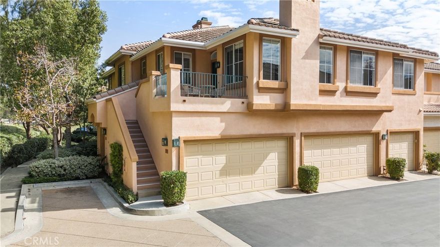 Welcome to 2400 Ladrillo Aisle, a bright and immaculate one-bedroom plus built out loft area condo available for lease in the highly sought-after Westpark community of Irvine. This rarely available Capri Plan G is reported to be larger than the standard Plan B, offering an expansive and versatile layout. Step inside to find a freshly updated interior with brand-new flooring throughout, soaring 9-foot ceilings, a cozy fireplace, and a generous separate dining area. The den offers a versatile space ideal for a home office, guest room, or cozy TV lounge area. The primary suite boasts a large walk-in closet plus an additional closet, while the en-suite bathroom features a dual vanity and a shower. The laundry room accommodates a full-size washer and dryer for added convenience. The upgraded kitchen is bathed in natural light and showcases ample counter space, pristine white appliances, and custom cabinetry. Large windows, custom draperies, and designer paint colors create a warm and inviting ambiance throughout the home. Step outside to the private patio deck, ideal for relaxing, entertaining or enjoying the fresh air. An individual garage with built-in storage cabinets provides secure parking and additional storage space. Just steps from the resort-style pool, residents also enjoy access to multiple pools, spas, tennis courts, and beautifully maintained parks. Centrally located near The District, Crossroads Shopping Center, and Culver Plaza, with an abundance of dining, shopping, and entertainment options. Don't miss this opportunity