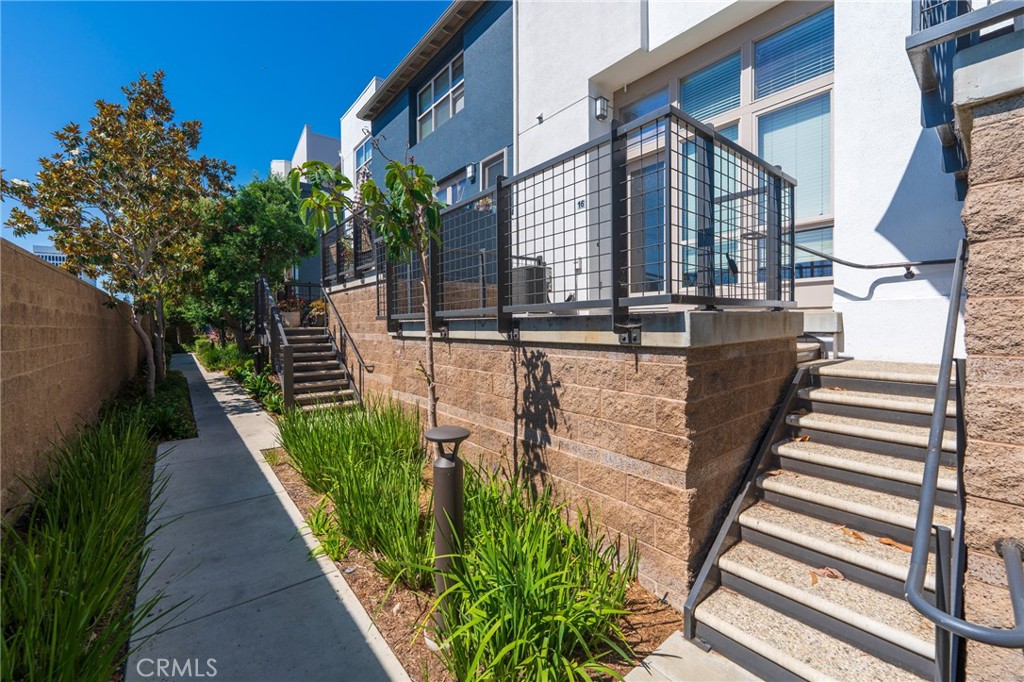 Welcome to 5402 W 149th Place #16, a bright and well-maintained 2-level townhome located in the desirable gated Fusion community in Hawthorne.
This functional and thoughtfully designed home offers a spacious layout with wood floors throughout, high ceilings, and plenty of natural light.
The open-concept main floor features a comfortable living and dining area that opens to a sunny private patio, perfect for enjoying your morning coffee or soaking up the sun. Upstairs, you'll find two large bedrooms, each with a full bathroom, and a laundry closet with washer/dryer. Central A/C keeps things cool year-round, and the attached 2-car garage offers direct access and ample storage. Fusion is a peaceful, well-kept community with resort-style amenities including a pool, spa, playground, sports court, and beautifully landscaped grounds.
Conveniently located near Manhattan Beach, El Segundo, major freeways, shops, and dining.
Vacant and easy to show.