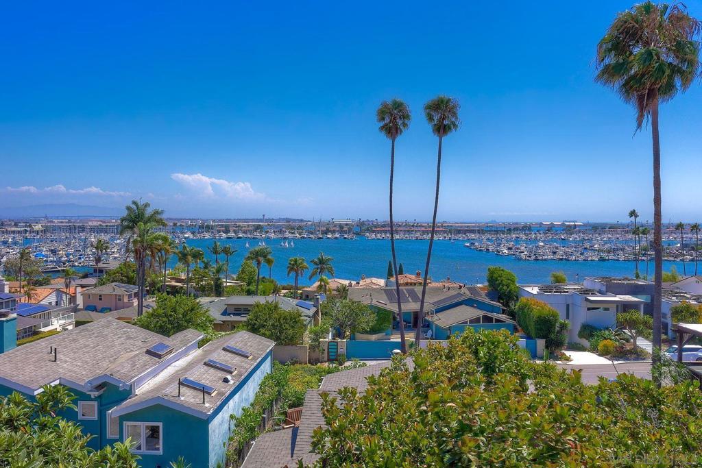 Views of the Marina, Cabrillo Point, Coronado bridge, Downtown Skyline and beyond. Welcome to La Playa, Point Loma! This timeless coastal contemporary home is a masterpiece of light and space. With 3 bedrooms, 3.5 bathrooms, and 2,422 sq. ft. of open, airy living, it effortlessly blends mid-century modern elements with updated, sophisticated finishes. Natural light floods every corner, inviting the outdoors in and making the ever-changing skyline part of your daily living experience. Step outside and you’re just blocks from La Playa beach, the San Diego Yacht Club, and all the charm of Point Loma Village—boutique coffee shops, eateries, and bayside strolls are just moments away. Whether you’re entertaining on the patio with the city as your backdrop or soaking in the quiet beauty of a morning sunrise over the water, this home offers a living experience that can’t be captured in photos—only felt in person.