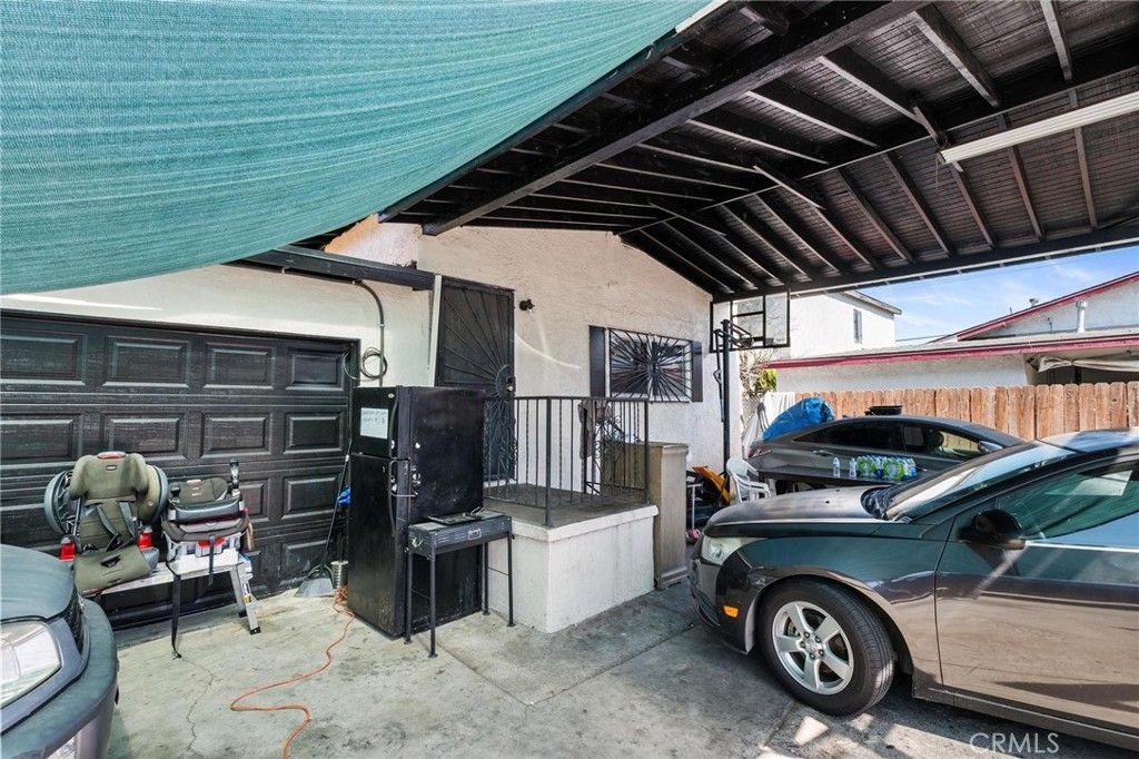 Photo of 1571 E 118th Pl, Los Angeles, CA 90059 (MLS # IV25233881)