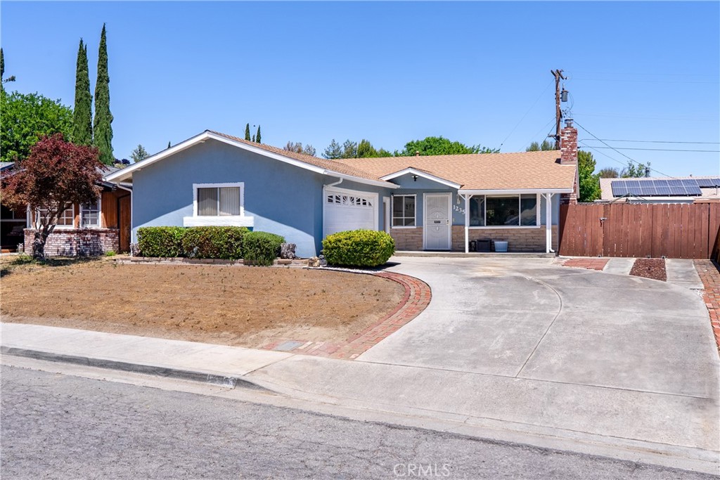 This well maintained home has been lovingly cared for by its' owner for over 47 years and is waiting for a new owner, you! It offers three bedrooms and two bathrooms in over 1100 square feet of living space. There's a fenced side yard that is large enough for RV or boat parking as well as tons of driveway parking, in addition to the two car attached garage. The rear yard is completely fenced and encompases a built-in BBQ, as well an extra large covered patio so that you can enjoy the outdoors year 'round! The landscaping in the rear is meticulous while the front yard awaits your individual taste. Shopping, schools, public transportation and more are just steps away and it's just a quick drive down Creston Road to downtown Paso Robles. The living room is open to the kitchen and boasts a wood burning fireplace insert to take the chill of the cool evenings. This place has good bones, as they say. Come see for yourself, you won't be disappointed.