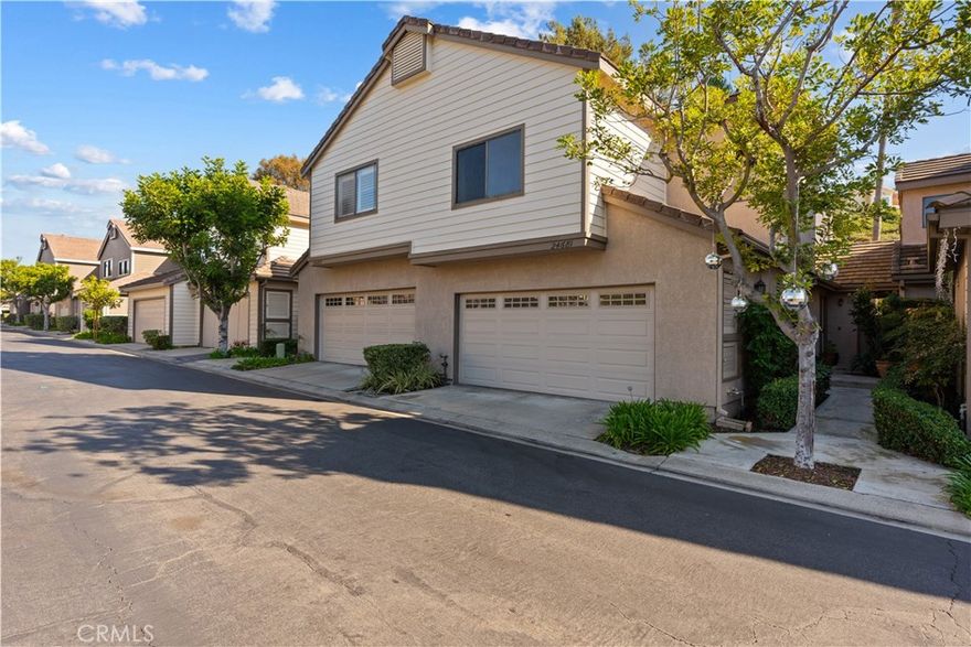 Welcome to the highly desirable and quiet community of Camden Court! Located just minutes from world class beaches and Dana Point Harbor. This recently renovated 1380 square foot, three bedroom, two and a half bath home is just what you're looking for. The spacious open floor plan flows seamlessly from the vaulted ceilinged great room into the newly remodeled and upgraded kitchen. Just a few steps takes you out to the low maintenance, hardscape back  patio. Newer gray laminate flooring throughout the ground floor and stairway blend into matching "wood" tile floor in the upstairs hallway and primary bedroom and bathroom. The large primary suite offers a beautifully updated, remodeled bathroom with dual vanity and walk-in shower. Two nicely sized secondary bedrooms and plenty of storage space finish off the second floor. The attached two car garage has plenty of room and storage for all of your extras and even has surfboard racks. The entire community of Camden Court has recently been painted and re-roofed. The property sits close to the community pool as well as tennis/basket ball courts, parks and a trail that leads directly to Salt Creek Beach.  Low HOA fees and no mello-roos. Don't miss this opportunity!