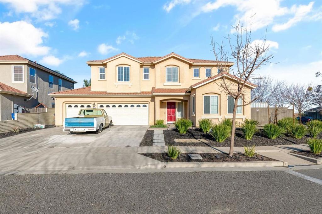 Welcome to this charming and spacious 4-bedroom, 3-bath home located in a peaceful neighborhood. This property offers a perfect combination of modern living and cozy comfort, ideal for families or anyone looking for extra space. The main floor offers a bright, open-concept living area, flooded with natural light perfect for family gatherings and entertaining. The kitchen is a chef's dream, featuring sleek countertops, ample cabinetry, and modern appliances. The primary suite is your personal retreat, complete with a luxurious en-suite bathroom. Four additional bedrooms offer plenty of space for everyone to unwind. The private outdoor space is perfect for hosting summer BBQs or enjoying a quiet evening under the stars. This move-in-ready home combines style, comfort, and practicality. Don't miss your chance to make it your new home.
