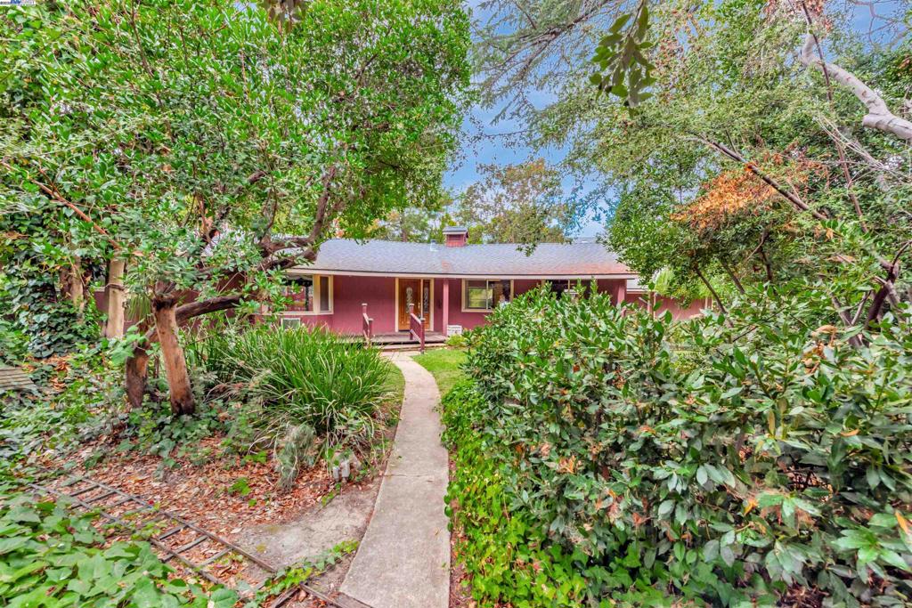 Welcome to a spacious single-story home tucked away in the sought after Niles neighborhood on an approx 16,500 sq ft lot. Just minutes from the heart of historic Niles with charming streets, local shops, galleries, and beloved restaurants, you’ll find a home that feels worlds away yet close to everything. This property offers a rare blend of size, location, and potential, whether you’re seeking a smart investment or a home to truly make your own. The living room features a vaulted ceiling and is the perfect setting for entertaining. The backyard feels like a natural sanctuary with room to garden, play, or create your dream outdoor oasis or possible ADU. A large detached three-car garage adds incredible flexibility and is a hobbyist’s dream. This location is ideal for commuters, just minutes to Niles Canyon, 880, 680, BART and Centerville Train Station. Close to great schools and convenient access to local parks, hiking trails, and scenic views, making it easy to embrace an active lifestyle while enjoying the beauty of nature. Come discover why so many choose to call this vibrant community home!