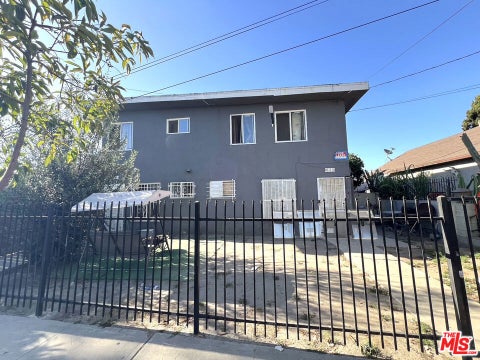 Photo of 823 E 111th Place #1/4, Los Angeles, CA 90059 (MLS # 26869391)