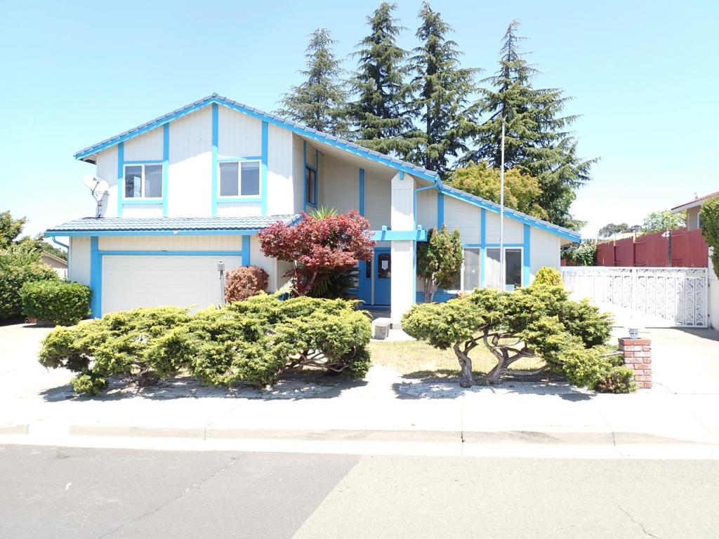 Spacious 4 Bedroom 3 bath home with views of the Bay! Once you enter this impressive home, you are greeted by a eye catching chandelier and high ceilings. To the Right is a enormous Living Room/Dining Room combo with vaulted ceilings. The Family Room has a wood burning fireplace, a bar w/sink, and a sliding glass door leading to the expansive backyard. The kitchen has hardwood floors and loads of cabinet and counter space. The Primary Bedroom and bathroom are something to behold! Indoor laundry room before you enter the garage. There are two driveways for parking! Driveway on Right has a drive through wrought iron gate for RV parking in the backyard. There is a storage shed for your gardening equipment to maintain the lovely grounds. This house is ready for your family to call home. It is going to sell fast!