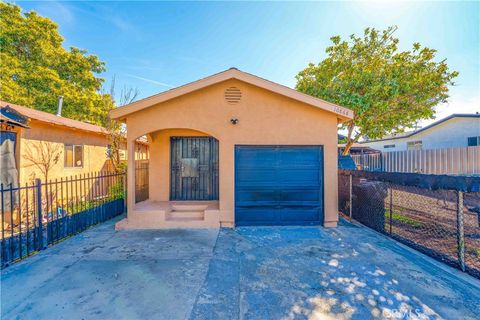 Photo of 10868 Weigand Ave, Los Angeles, CA 90059 (MLS # DW26043165)