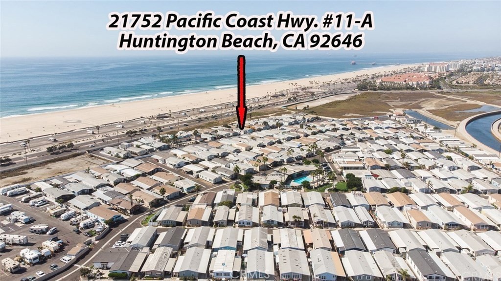 Across the street from the OCEAN with new upper Ocean viewing deck!!! Very Rare Find! An awesome beach house in the lovely Cabrillo Waterfront Village. Look no more! Completely Remodeled! Gorgeous open floor plan, with giant living and dining room. This beautiful home has 3 bedrooms and 2 bathrooms at 1,120 sqft. Home has BRAND NEW water Heater, BRAND NEW Recess Lighting throughout entire Home. BRAND NEW Remote ceiling Fans Throughout. BRAND NEW Bar/Island Pendent Lighting. BRAND NEW updated Lighting switches and BRAND NEW electrical outlets throughout. New Refaced Cabinet frames with Brand new Shaker Cabinet Doors and handles, Just installed for $7,000!!! Newer Wood Laminate Flooring throughout & Newer Interior and exterior paint with 5-inch baseboards throughout. Newer outside Wooden fencing. This home is light and bright with Refrigerator, dishwasher, Washer and Dryer with separate laundry room all included. The kitchen has Newer butcher block countertops. The master bedroom has a Giant mirrored Walk-In closet and newer vanity and faucets with double sinks in master bathroom. Also, newer vanity and sink in 2nd bathroom. Newer Central Heater. Also, included is a Large outside storage shed. 4 cars, private parking & guest parking are also available. This home has a Newer Metal, concrete and stone upper PRIVATE side deck for viewing the ocean sunsets, sand, Catalina Island and mountain views!!! 1 year home warranty included! You can also park 1 car under the deck and one car in the side yard. Also, 2 reserved parking spots out front of the home. The monthly park lease is only $3461.00/month which is the lowest in the park, which includes access to the newly upgraded community clubhouse, pool, and newly upgraded gym are all located in the park’s private community with security. Located down the street from the famous “Surf City” Huntington Beach Pier and Main Street. Also, enjoy "Pacific City" with new shops and restaurants.