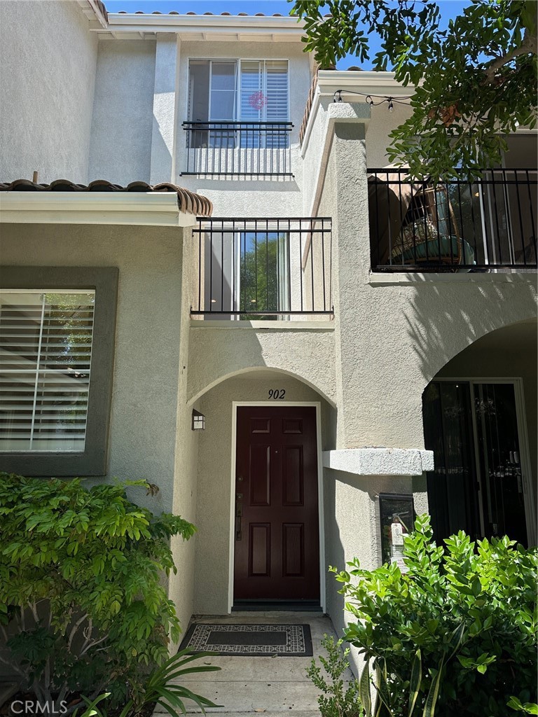 Situated in a quiet interior location within the prestigious gated community of Oak Creek in Irvine, this bright and spacious one-bedroom, one-and-a-half-bathroom townhouse offers approximately 900 square feet of well-designed living space. This home features an attached two-car garage and access to various community amenities, including a pool and spa, clubhouse, fitness center, tennis court, and basketball court.
Upon entering the home, you are greeted by a formal foyer containing a coat closet and providing access to an oversized garage with washer and adryer. A set of stairs takes you to the second floor where you encounter an open floor plan with newer laminate flooring throughout. This level contains the seamlessly connected living and dining room areas, a kitchen, and a powder room. The inviting living room boasts beautiful tree-top views and provides direct access to a private balcony where you can enjoy your morning coffee or the evening breeze under the stars. The dining area feels exceptionally spacious due to its wall of mirrors. The kitchen was fully remodeled two years ago and is equipped with granite countertops, a large sink, dishwasher, range, refrigerator, and microwave.
The primary bedroom and bathroom are located on the third floor. The bedroom has a large window which provides abundant natural light and beautiful tree-top views while maintaining privacy. The primary bathroom is equipped with dual vanities and a tub-shower combination. Additional highlights include a walk-in closet, plush carpeting, and plantation shutters.
The prime location of this property, away from local traffic noise, provides a peaceful and quiet environment, while still remaining within walking distance of the Oak Creek Shopping Center and distinguished IUSD schools. Its central position in Irvine provides easy access to the UCI campus, Irvine Spectrum, South Coast Plaza, Southern California beaches, and a wide array of shopping, dining, parks, and open spaces.