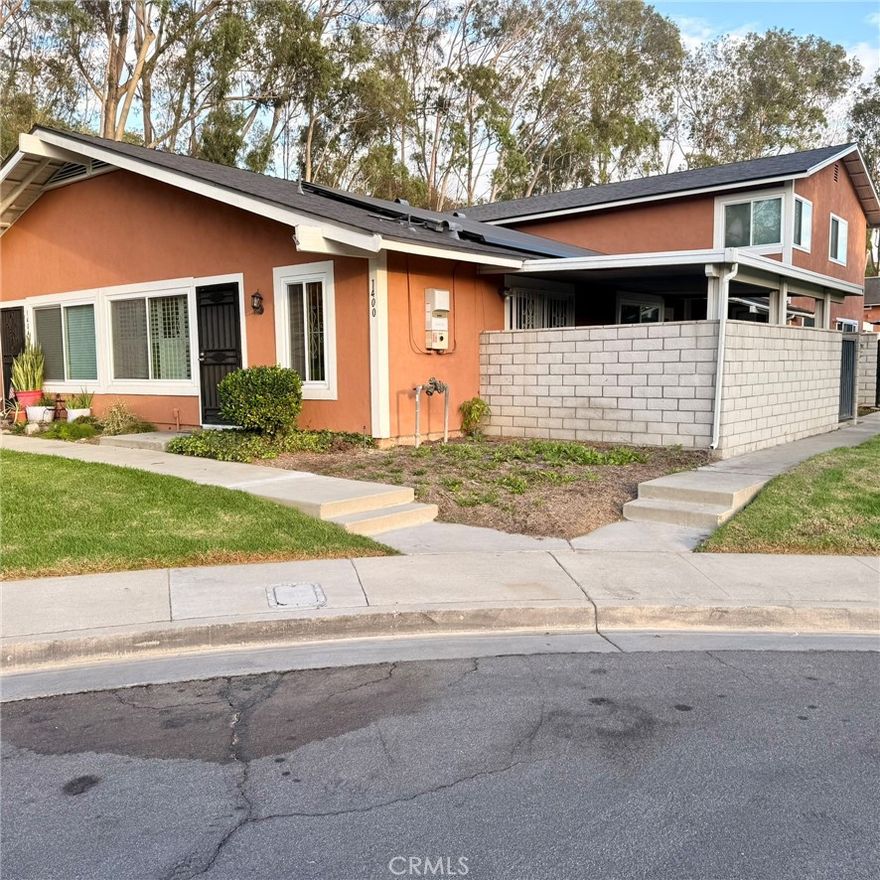 Stunning West Covina Woodside Gem: Single-Story, Updated & Amenity-Rich! Move right into this charming, single-story townhome in the sought-after Woodside community. Designed for easy living, the home features a light-filled Living room and a spacious kitchen with stainless steel appliances. Two spacious bedrooms, a full hall bath, and a dedicated indoor laundry add unmatched convenience. Enjoy the private covered patio perfect for evening relaxing. The community offers a pool, playground, and basketball court—everything your family needs for weekend fun. Comfort, convenience, and community—it's all here!
