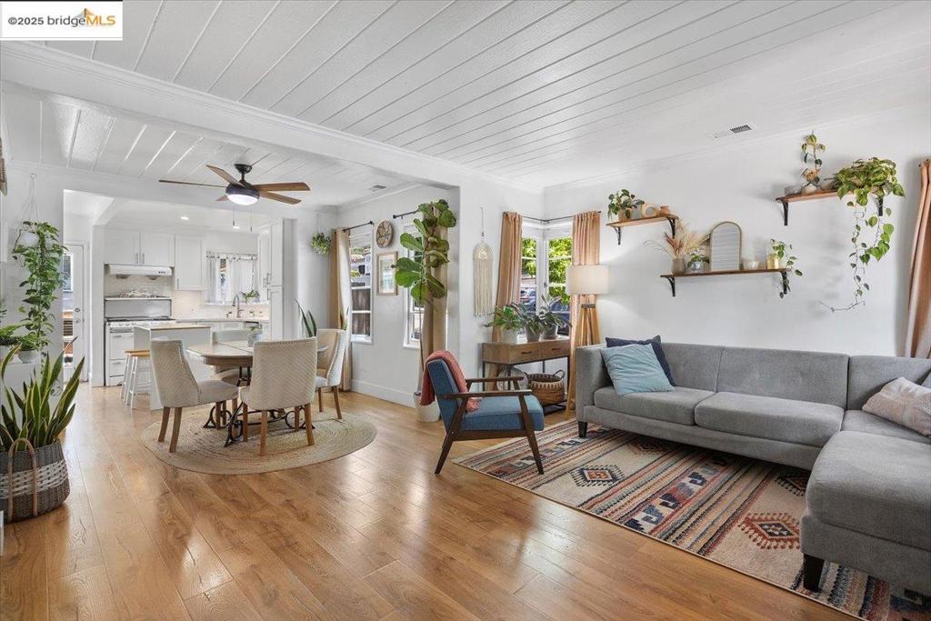 Nestled on a picturesque, tree-lined street in the heart of the vibrant Dimond/Laurel District, this charming 2-bedroom, 1-bath home captures attention from the very first glance. Thoughtfully updated, the home features a modern kitchen with brand-new cabinets & sleek quartz countertops. New, gleaming floors throughout and fresh exterior paint add warmth and curb appeal. The recently renovated bathroom showcases beautiful tile work, new vanity and tub. Sunlit and inviting throughout, this home is perfect for both relaxing and entertaining. Being a corner lot, the landscaped front and side yard offer opportunities for gardening or having a cup of coffee as you enjoy the sunshine in the front yard. Step outside into the expansive, enclosed backyard - a private retreat ideal for gatherings, gardening, or simply unwinding. Plenty of space to accommodate fruit trees and the generous lot presents exciting potential for a possible ADU addition. A lovely covered patio area provides a seamless indoor-outdoor lifestyle. The detached two-car garage offers flexible use as a home office, media room, gym, storage, or creative studio. Plus, a unique bonus space, soundproofed and perfect for musicians, podcasters, or anyone seeking quiet focus.