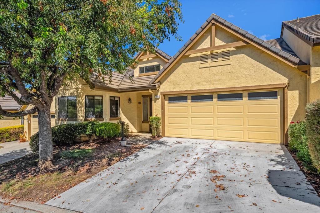 Welcome to 7597 Tayside Drive, a beautifully remodeled 2-bedroom, 2-bathroom home in the highly sought-after 55+ community of The Villages in San Jose. This 1,307 sq. ft. residence offers fresh paint, new waterproof laminate flooring, skylights, and a spacious living/dining area with a wood-burning fireplace and access to the yard with fruit trees. The modern kitchen features quartz countertops, designer backsplash, recessed and pendant lighting, and stainless steel Samsung appliances. The primary suite boasts double sinks, quartz vanity, a soaker tub, separate shower, and large closets, while the updated hall bath includes new tile and fixtures. Additional highlights include central heating and A/C, side-by-side laundry, storage cabinets, and a 2-car garage. The Villages provides resort-style amenitiesgolf, pools, tennis, fitness centers, clubs, and walking trailsall within a secure 24-hour gated community. Conveniently locate