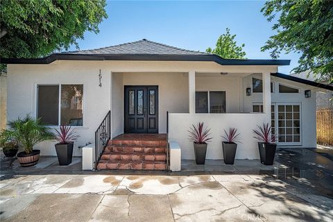 Photo of 1512 W 36th ST, Los Angeles, CA 90018 (MLS # PW26111590)