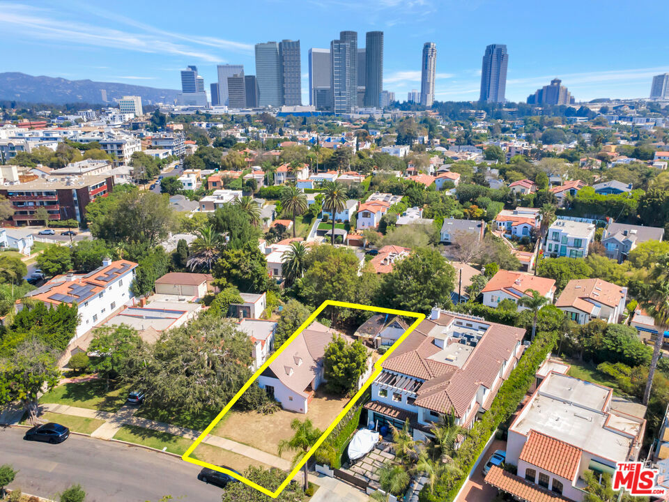 Exceptional development opportunity in Westwood/West LA, 1914 Westholme Ave sits on a rare, deep 7,849 sq ft lot with an existing original 1930s cottage, offering an ideal tear-down/rebuild or trophy single-family project for builders and homeowners alike. Zoned R1 with strong neighborhood comps and proximity to Westwood Village, UCLA, Brentwood and Santa Monica, this parcel invites a substantial new construction or a bespoke modern estate as neighboring contemporary rebuilds on Westholme illustrate the scale and finish that can be achieved. Perfect for developers seeking a prime lot or an end-user ready to build their dream home, contact the listing agent for zoning/permit details, recent comps and to schedule a private tour.