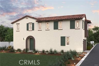 Welcome to Rose Glen, Upland's newest gated community, where sustainability, style, and comfort effortlessly blend. Don’t miss your chance to own a brand-new home in this desirable neighborhood, featuring no Mello Roos and a low tax rate! Plan Two presents 1,572 sq. ft. of well-planned living space that perfectly balances efficiency and comfort. With 3 bedrooms and 2.5 baths, this delightful home is ideal for families looking to expand or those who simply desire extra room. The main floor's open-concept design beautifully connects the living and dining spaces, making it perfect for cozy weekends or family get-togethers. All-Electric Home: Step into a modern lifestyle with sustainability and energy efficiency at its core. Owner's Suite: Pamper yourself in a luxurious suite complete with dual sinks, a separate tub and shower, and a spacious walk-in closet. Mezzo - White/ Fawn Option Package: Relish in the elegance of white cabinetry, quartz countertops with a full tile backsplash, Shaw LVP flooring, Shaw carpet, and brushed nickel Kohler fixtures. The community also includes a tot lot and exercise equipment, ensuring fun and fitness for all residents. Find the perfect combination of timeless design and contemporary amenities at Rose Glen.