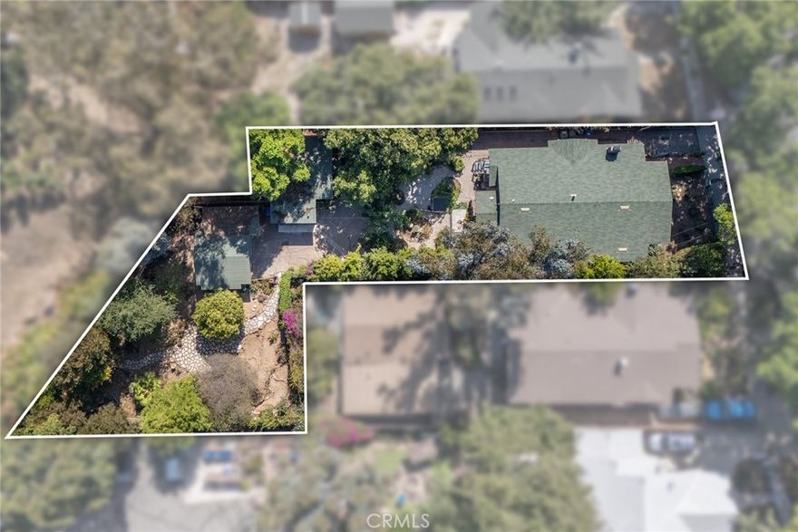 Zoned LARD2 to be sold with the adjoining parcel APN#557-601-7030 which consists of two separate homes-3 bed/2 bath, 1bed/1bath, and detached two car garage.
