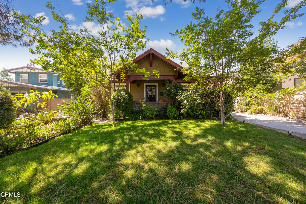 Timeless Charm Meets Modern LuxuryExperience the perfect blend of classic craftsmanship and contemporary living in this exquisitely renovated 1912 Craftsman-style home. Thoughtfully reimagined from top to bottom, this stunning residence retains its historic charm while offering all the modern amenities for today's lifestyle.Inside, you'll find four generously sized bedrooms plus a private upstairs guest suite complete with its own stylish full bath 'ideal for visitors, extended family, or a dedicated home office.The formal living room exudes warmth with its original leaded glass windows and a cozy wood-burning fireplace, flowing seamlessly into the spacious formal dining rooma'perfect for hosting gatherings. Just off the living area, a charming den offers the ideal retreat or creative workspace.At the heart of the home is the beautifully updated gourmet kitchen, featuring granite countertops, stainless steel appliances, and direct access to the backyard for easy indoor-outdoor living.The luxurious primary suite, located at the rear of the home for added privacy, offers a serene escape with its own fireplace, an indulgent spa-inspired bath with oversized tiled shower, and a large walk-in closet.Down the central hallway, you'll find three additional bedrooms and two thoughtfully remodeled full bathrooms.Additional Features Include:Private upstairs guest suite with full bathUpgraded plumbing and electrical systemsDual-pane, energy-efficient windows