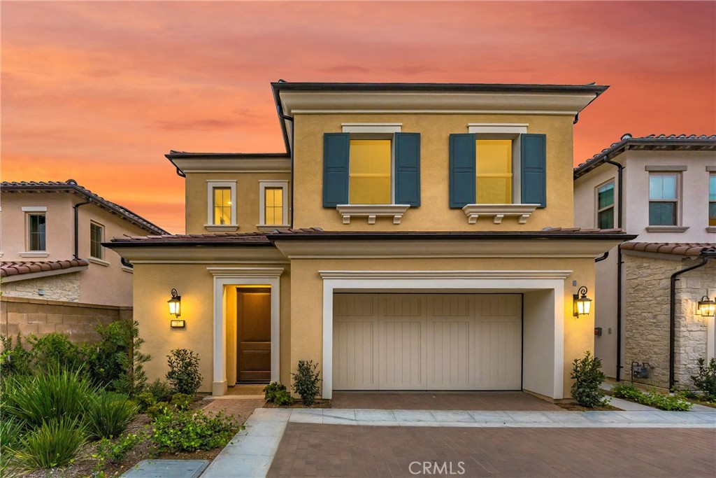 Brand new 4-bedroom, 2.5-bathroom home in the desirable community of Portola Springs. The open-concept layout features a spacious great room that flows into the dining area and gourmet kitchen, highlighted by quartz countertops, stainless steel appliances, a 6-burner cooktop, custom backsplash, walk-in pantry, and large center island. The primary suite offers a private retreat with a walk-in closet, dual vanities, soaking tub, and separate shower. Three secondary bedrooms share a full bath, and the laundry room is conveniently located upstairs. High ceilings, hardwood floors, and sliding glass doors create a seamless indoor-outdoor connection. Situated on a quiet corner lot at the end of the street. Residents enjoy world-class amenities including the brand new Hillcrest Clubhouse, Monarch Park, over 15 beautifully maintained parks, more than 10 sparkling pools, and miles of scenic walking trails—all within the vibrant neighborhood of Portola Springs.