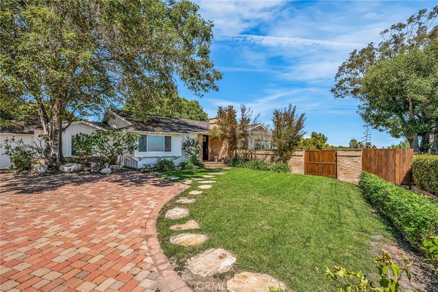 Stunning Remodeled Ranch-Style Home with Panoramic City & Harbor Views

Welcome to your dream retreat! This beautifully appointed ranch-style residence offers breathtaking views including sweeping vistas of the city and harbor. Enjoy these spectacular sights from nearly every room, as well as from the expansive, lushly landscaped backyard.

Upon arrival, you’ll be greeted by a Grand entrance to an impressive motor court with a four-car garage—ample space for guests and family alike. Step inside to a sunlit formal living room with a cozy fireplace, a spacious family room, and an elegant dining area—all designed to maximize the stunning views and create seamless indoor-outdoor living.

Host unforgettable gatherings on the large covered patio or the flagstone terrace, complete with a fire pit—perfect for entertaining under the stars. The newly remodeled kitchen features stone countertops, a center island, double oven, SubZero refrigerator, and picturesque views of the rear garden patio.

The luxurious master suite, tucked away in the south wing, boasts a custom-finished walk-in closet and a spa-like bath with a soaking tub and steam shower—your own private sanctuary. Refinished hardwood floors flow throughout the home.

Located on a quiet street within the highly sought-after Palos Verdes School District, this home offers quick access on and off the Peninsula and is moments from shopping, dining, entertainment, and top-rated schools.

Experience all that Rancho Palos Verdes  has to offer—schedule your private tour today!