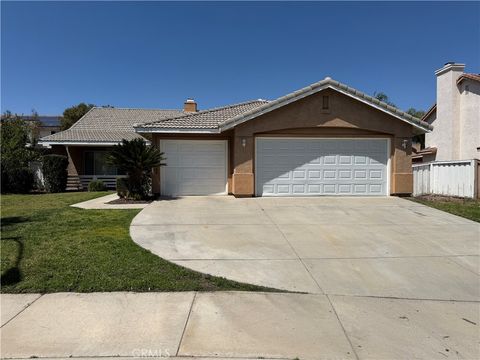 Photo of 15128 Versailles ST, Lake Elsinore, CA 92530 (MLS # IV26095010)
