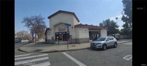 Photo of 208 E Holt AVE, Pomona, CA 91767 (MLS # AR26147440)