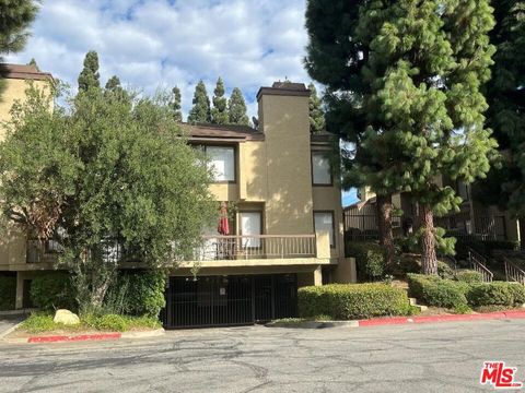 Photo of 849 E Victoria Street #302, Carson, CA 90746 (MLS # 25613817)