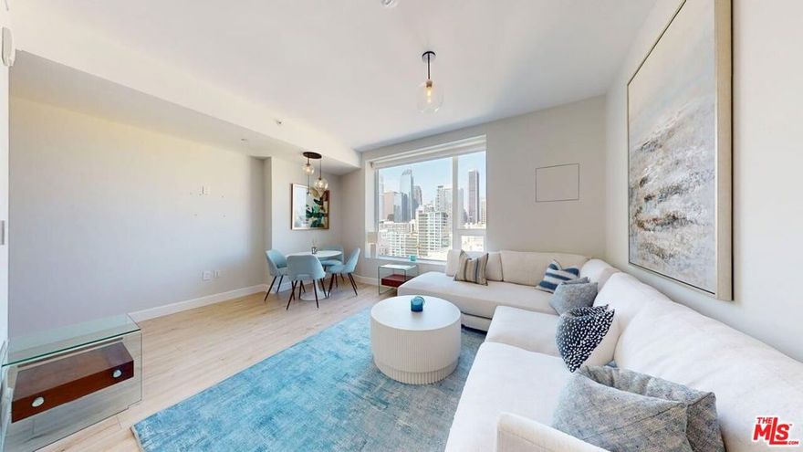 RARE STORAGE INCL.... EXCEPTIONAL, REMODELED 1BR/1BA unit for lease in Ten50, the newest of the high-rise condo bldgs. in South Park, DTLA, with awesome unobstructed, panoramic North views of the downtown skyline. The unit has hardwood/bamboo floors, kitchen with Carrera marble countertop and backsplash, lacquer-finished Domus & Domas Italian cabinetry, Fisher & Paykel cooktop, LG refrigerator, LG dishwasher, Fulgor Milano oven, and stacked washer & dryer inside. Purchase incl. 1-parking & 1-storage in the building garage. The building has resort-like amenities incl. large clubhouse, large gym, movie-room, media-center, and a large 6th-floor rooftop terrace with pool, spa, BBQ, pool table, sundeck & lounge chairs, and a drone-delivery spot. Explore the vibrant neighborhood with Pine & Crane, Orange Theory Fitness, South Park Grocery, Prank Bar, Culturas, Sonoritas, Starbucks, and more. Plus, you're just moments away from the Crypto.com Arena, LA Live, Ritz-Carlton, USC Village, Whole Foods, Bottega Louie, and the Pico Metro Station, making commuting a breeze. With a Walk Score of 95 and a Transit Score of 100, you may never need a car again. Downtown LA is undergoing major transformations in preparation for the 2028 Summer Olympics, with billions invested into development, including new infrastructure and upgrades. Invest in the future of LA today! Also available for lease at $2900. AGENTS SEE PRIVATE & SHOWING REMARKS!