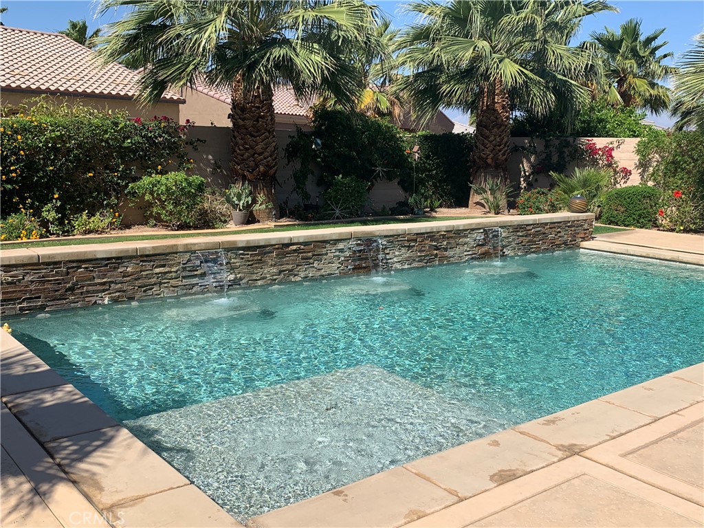 Sun City Shadow Hills +55 community. A beautiful spacious single level, 3 bedroom, 2 bathroom home with a private pool in a quiet neighborhood. Includes a washer and dryer, full size refrigerator and wine fridge in wet bar for use during lease. Wet bar is off the entrance with sink. Primary bedroom faces the backyard view of the private pool. There is a large walk-in closet, separate shower and soaking tub and double sink vanity. 2nd and 3rd bedrooms have a separate hall to enter with full size guest bathroom. This property is close to the Shadow Hills Clubhouse which has full workout equipment, indoor track, tennis courts, sports courts, meeting rooms and much more. Located in a gated community with impeccably manicured landscape and breathtaking golf course. This home is the Haven model floorplan 3rd phase. Lease includes monthly HOA dues, weekly landscaper/lawn service and pool service and solar fees.