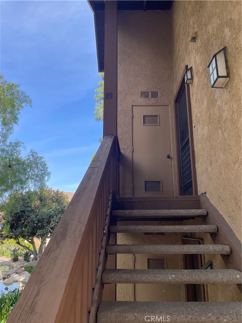 Photo of 89 Lemon Grove Grv, Irvine, CA 92618 (MLS # OC26067183)