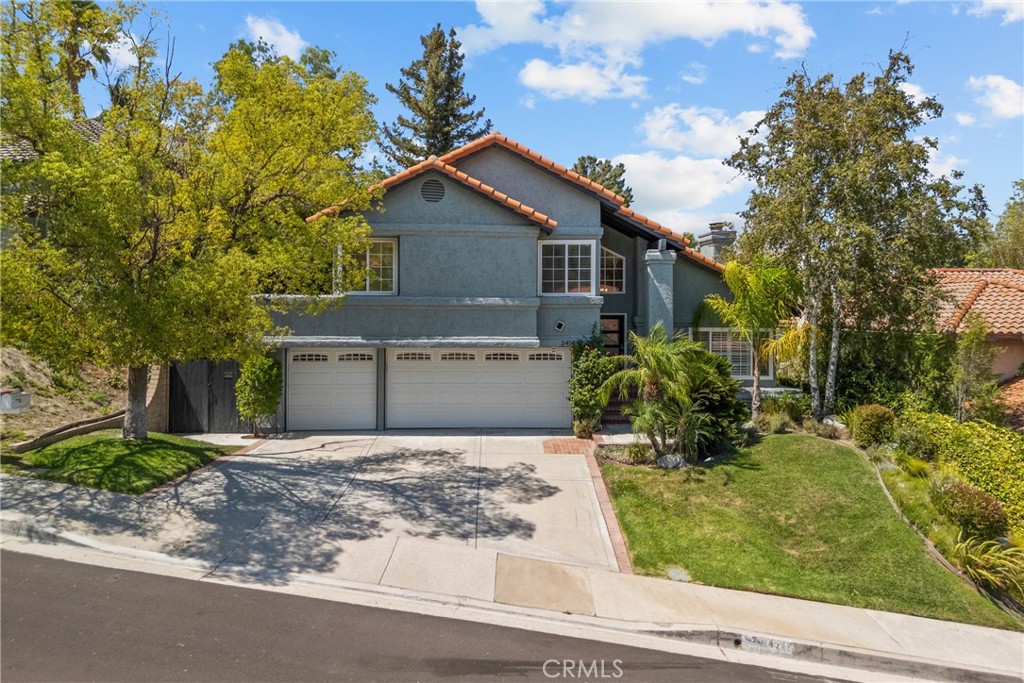 Welcome to your dream retreat in the heart of Hidden Valley, Newhall! This stunning home features a beautifully remodeled primary suite designed for ultimate comfort—complete with a spacious walk-in closet and a fully renovated spa-inspired bathroom. It’s the perfect place to unwind at the end of the day.
This 4-bedroom, 3-bathroom home is filled with upgrades, including brand new luxury vinyl plank flooring throughout, a new A/C unit, and a recently redone roof. The smart home features adds modern conveniences, while two cozy fireplaces create inviting spaces for family and guests. Upstairs, a versatile loft offers extra room for a home office, gym, or playroom.
Outside, enjoy your private backyard oasis with a sparkling pool, spa, and lush green space—ideal for relaxing or entertaining. The oversized three-car garage provides ample storage options.
Located in the highly sought-after Hidden Valley community with easy access to the 5 freeway for commuters, this home also offers access to fantastic HOA amenities: community pool and spa, tennis and pickleball courts, scenic hiking trails, a playground, and gated RV/boat storage (subject to availability through the HOA).
Don’t miss this incredible opportunity to own a move-in-ready home in one of Newhall’s most desirable neighborhoods!