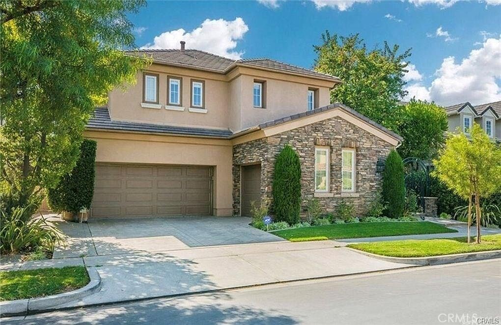 FURNISHED HOUSE. Spectacular estate is located in 24 hours Guard-Gated prestigious community of North Park. This gorgeous single family house WITH elegant FURNITURES has 1 bedroom and 1 full bathroom downstairs, 1 master bedroom with private den, and 2 bedrooms upstairs. The gym room on the main floor can be 5TH BEDROOM. The kitchen has upgrades including the quartz countertops, cabinets, built-in refrigerator and wine refrigerator. The main floor with abundance sunlight is multi-functional, having the wonderful breakfast in the open kitchen sitting around the island, watching TV in the family room with family members by cozy fireplace, having dinner in the formal dining room, enjoying the casual time like playing games in the high ceiling living room with friends. The property has spacious backyard with privacy, sitting area is ideal for outdoor enjoyment and relax. Enjoy walking distance to trails, parks and pools. Close to schools, malls, supermarkets and restaurants, the life is very convenient.