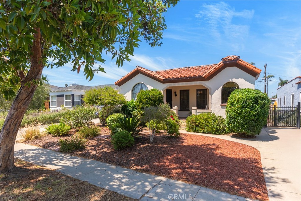 Discover this inviting Spanish Revival home, nearly 100 years old in the coveted neighborhood of Beverlywood. The tree lined street of charming homes
and the old world charm of this unspoiled 1927 home is what sets it apart. 2 bedrooms, 1 bathroom and don't miss the approx. 225 square foot guest room and bathroom in the backyard next to the approx.324 sq. ft Professional Sound Studio. The beautiful front yard welcomes you to the lovely front
porch nto the charming living room with original tall, wood ceilings, large picture window and fireplace with gas insert for cozy winter nights.
The dining room has lots of light and kitchen with Spanish Tiles and charming breakfast nook, bathed in light for enjoying your morning coffee. All appliances installed in past 3 years, including stacked washer/dryer in the laundry area. The entire house has the original wood floors, tile in Kitchen and bathroom. Primary bedroom has a charming dressing area with a wall of closets. The second bedroom, currently used as an office/library has the door to the spectacular backyard space. In addition, original wood closets/drawers in the hallway between the bedrooms. The bathroom is beautifully tiled with a separate tub and shower with windows facing the back garden. The sink is in a charming antique cabinet. When you step outside, a luscious garden with a paver patio to relax on with Roses, Hydrangeas, Fruit Trees and many flowering plants with stepping stones to the "Beach Area" outside the Guest Bedroom and Bathroom. In addition, the State of the Art Sound Studio w/ Split unit for Heat/Air. You will never want to leave this little bit of paradise.
Not to miss the rain barrels to water the garden. With a walk score of 74, near restaurants, shops, coffee all a short walk up to Roberson. LAUSD schools
Castle Heights Elementary, Palms Middle School and Hamilton High School. Close to studios, Culver City, Beverly Hills and freeway convenient.
UPGRADES : NEW ROOF, BOLTED FOUNDATION, SPLIT UNIT WITH HEAT/AIR VENTING TO ENTIRE HOUSE. GEORGEOUS GARDEN, GUEST UNIT, SOUND STUDIO, RAIN BARRELS and more.