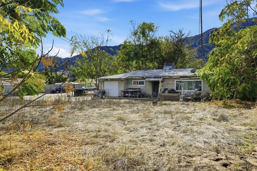 EXCELLENT PRICE! 3 bed, 2 bath family home. Granite kitchen and fireplace on a big lot!