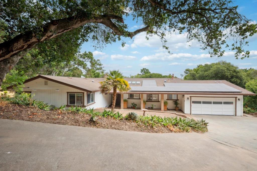 $50,000 Price Improvement! Welcome to 281 School Rd, a stunning 4-bedroom, 2.5-bathroom home nestled on 5.36 fully fenced and gated acres in the peaceful countryside of San Juan Bautista. With a recent $50,000 price improvement, this 2,092 sq ft home offers an incredible opportunity to own a beautifully updated property blending rustic charm with modern comforts. Inside, enjoy vaulted ceilings, two cozy fireplaces, a remodeled kitchen and bathrooms, central A/C, wood-style flooring, and a spacious kitchen island perfect for entertaining. Step outside to multiple patios and decks, a gazebo, a sundeck, and an astronomy deck; ideal for peaceful evenings under the stars. The 800 sq ft detached garage/shop/barn is perfect for RVs, hobbies, or storage. Additional features include a solar system, private shared well, septic system, and fully fenced property. Located just minutes from downtown San Juan Bautista, and approximately 30 minutes to the coast or 40 miles to San Jose, this home delivers privacy, comfort, and convenience. With this new price, it's the perfect time to make your move.