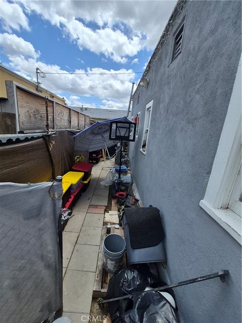 Photo of 616 W Wilson Ave, Pomona, CA 91768 (MLS # CV26092107)