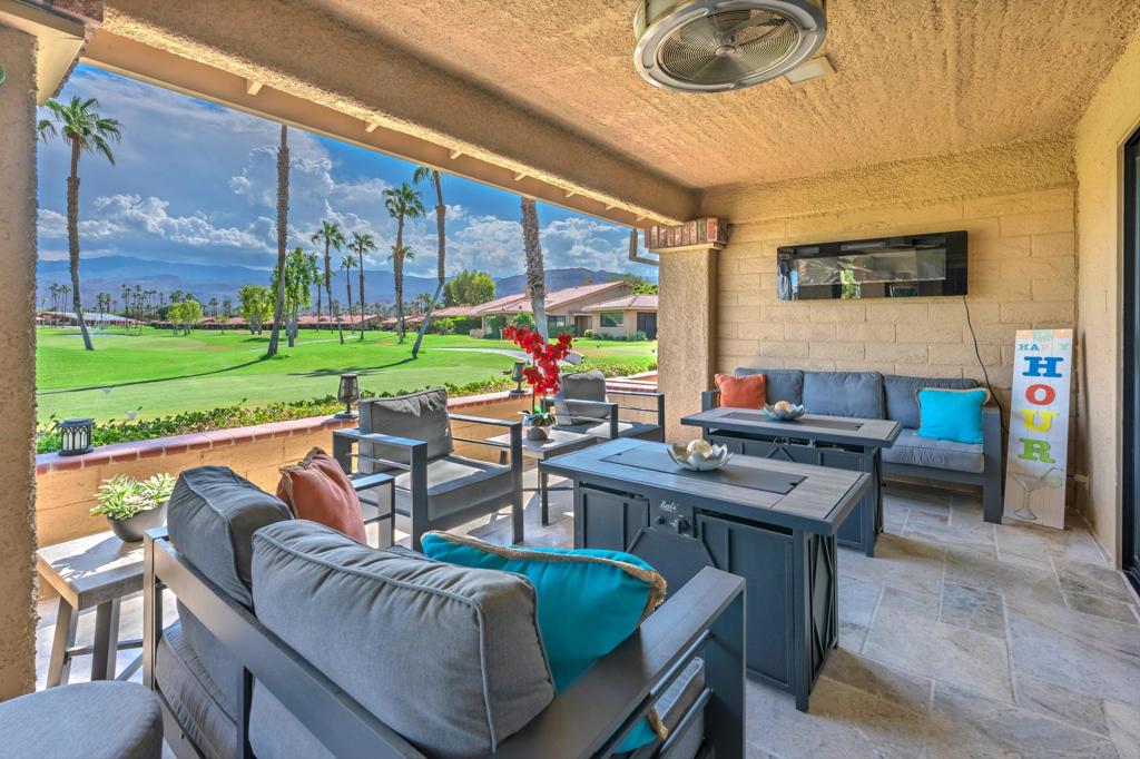 VIEW, VIEW, VIEW! This beautifully RENOVATED 2BD/2BA looks SOUTH all the way down the 1st fairway! Just 2 doors from the pool, this IMMACULATE & METICULOUSLY MAINTAINED home has every element necessary to enjoy full-time living or simply a second home get-away. Travertine stone flooring throughout, interlocking pavers on the driveway and private walkway to the front door. ISLAND KITCHEN, Dual pane windows, LED lighting throughout and surround sound speakers in the living room. FURNISHINGS NEGOTIABLE and Seller's LOAN IS ASSUMABLE at 2.25%! Buyer to do due diligence regarding loan assumption.All Buyers are required to pay $5000 at closing for the Capital Reserve Fund. The 3rd ''HOA'' fee of $100/mo is capped at $6000 and ends in 2030.