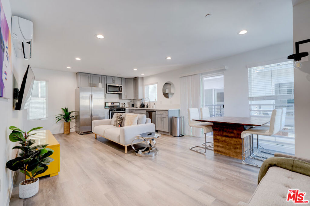 Experience modern living in this brand-new 3-bedroom, 3.5-bath townhome located near Normandie Ave and Washington Blvd, just minutes from Downtown LA, Koreatown, and USC. This spacious, light-filled home features a smart layout with en-suite bathrooms in every bedroom and a convenient guest powder room. Enjoy upscale finishes throughout, including a stylish kitchen with quartz countertops and stainless steel appliances, central air, in-unit washer and dryer, and two private balconies in the front and back, perfect for relaxing or enjoying fresh air. The property offers gated entry, 2 assigned parking spaces, and is pet-friendly with approval. Available for immediate move-in.