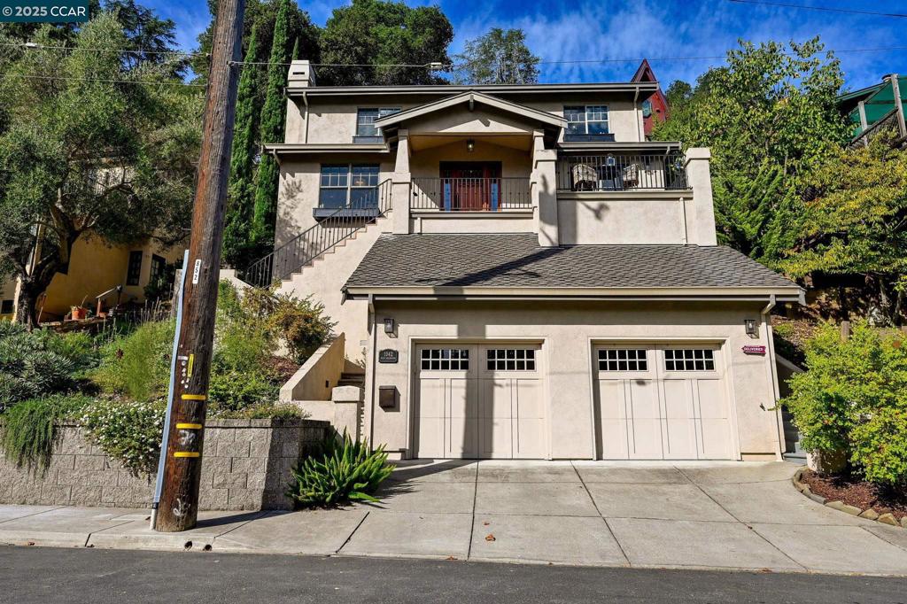Modern Craftsman with Water Views in Walkable Downtown Martinez! Just steps from the heart of town, this custom home offers water views, designer finishes, and a flexible layout. Main-level living features a serene space with cozy fireplace, hardwood floors, and curated touches. The upscale kitchen boasts a Wolf range, Miele appliances, and sleek finishes. Dine with a view—on the deck or inside, the water is always in sight. Upstairs, the primary suite is a private retreat with fireplace, spa-like en suite with steam shower, and more views. Two bedrooms and an updated bath complete the level. The lower floor, with separate entry and full bath, is perfect as a family room, guest suite, studio, or potential rental. Private elevator connects all three levels. Zen-inspired outdoor space invite relaxation and entertaining. Paid solar, Enphase battery backup, tankless water heater, and whole-home water filtration are great upgrades. Enjoy a tight-knit, highly walkable neighborhood minutes to breweries, cafes, restaurants, waterfront trails, and the farmers market.