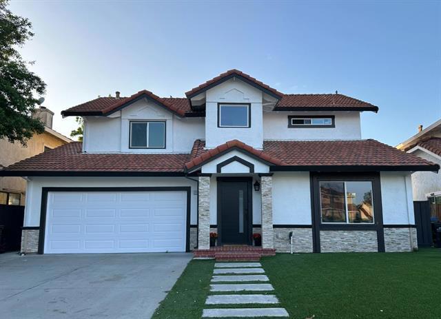 Welcome to this charming 4-bedroom, 3-bathroom home with vaulted ceiling spanning 1,746 square feet. Updated kitchen that is right off the backyard, creating easy access for entertaining indoors or out. Enjoy the cozy backyard with an open view as there are no homes obstructing the view. The home is equipped with central AC and Heating, keeping the house at a comfortable temperature at all times. Just minutes away you have access to supermarkets, shopping mall, Target, Costco, restaurants, parks, schools, public transportation and freeways. A must see!